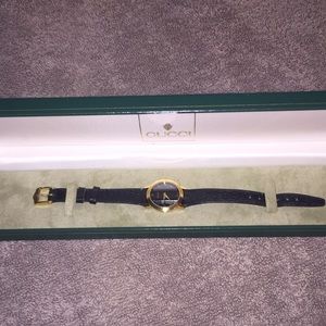 Gucci watch from Saks Fifth Ave.